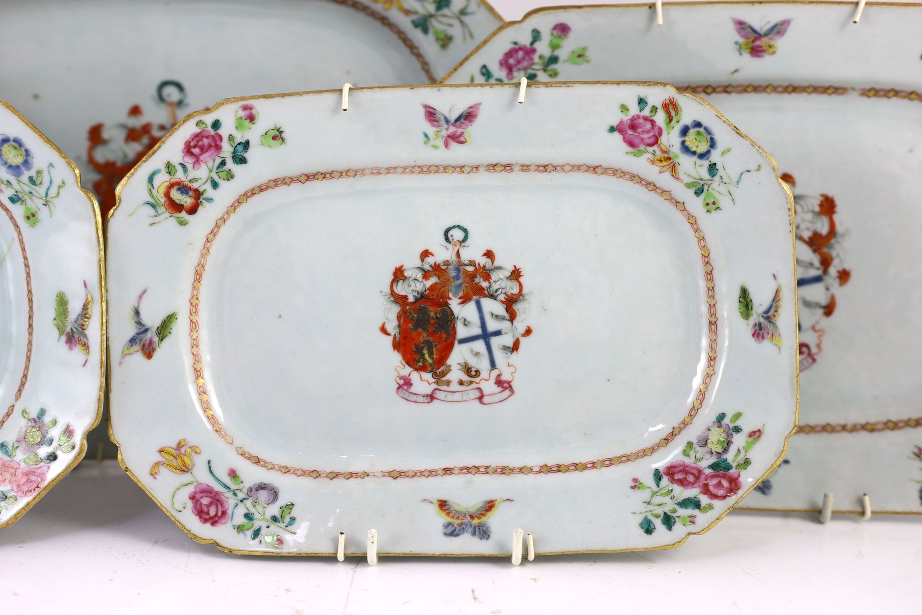 A set of five Chinese Armorial meat plates, circa 1755, with painted central Ross Family Coat of Arms, with motto - 'Nobilis Est Ira Leonis' 26 cm – 33 cm, some cracks